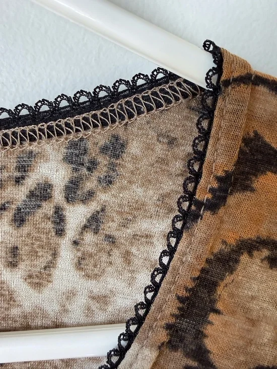 Sasson sheer Y2K animal print babydoll top with long flare sleeves lettuce hem. - Picture 4 of 6